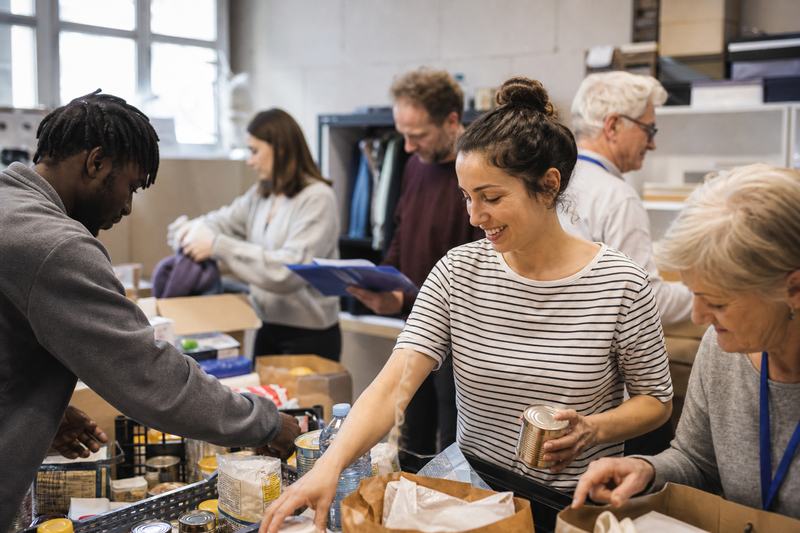 Volunteers helping families at a community event